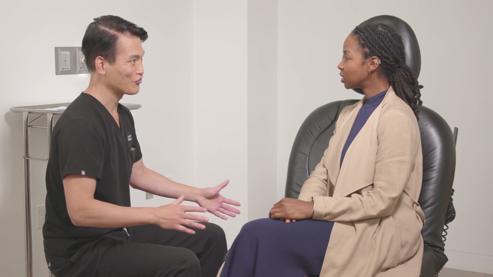 Larry Fan, MD in consult at 77 Plastic Surgery